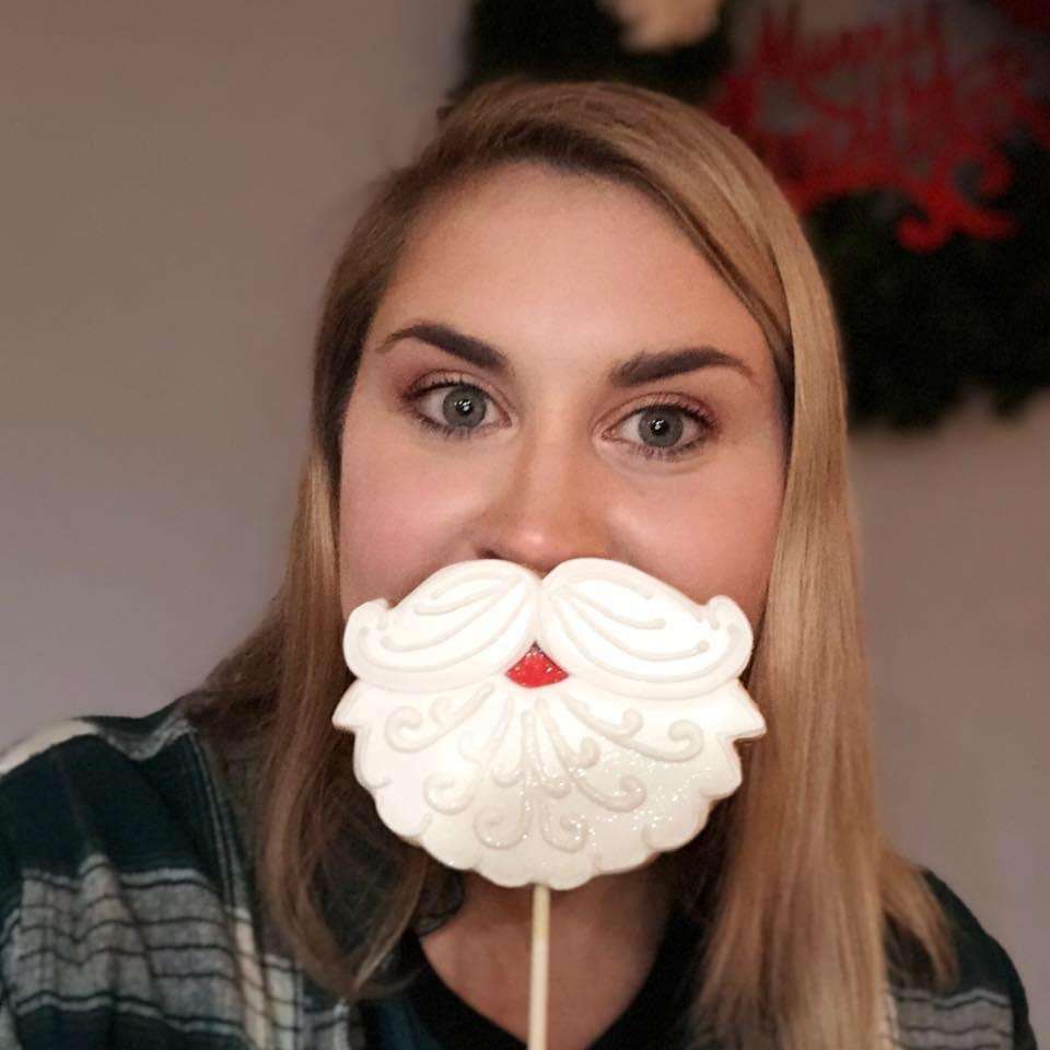 Women with Santa Cookie